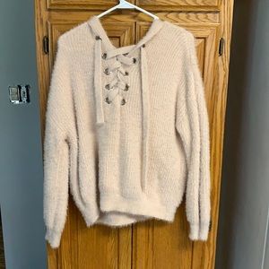 light pink sweater